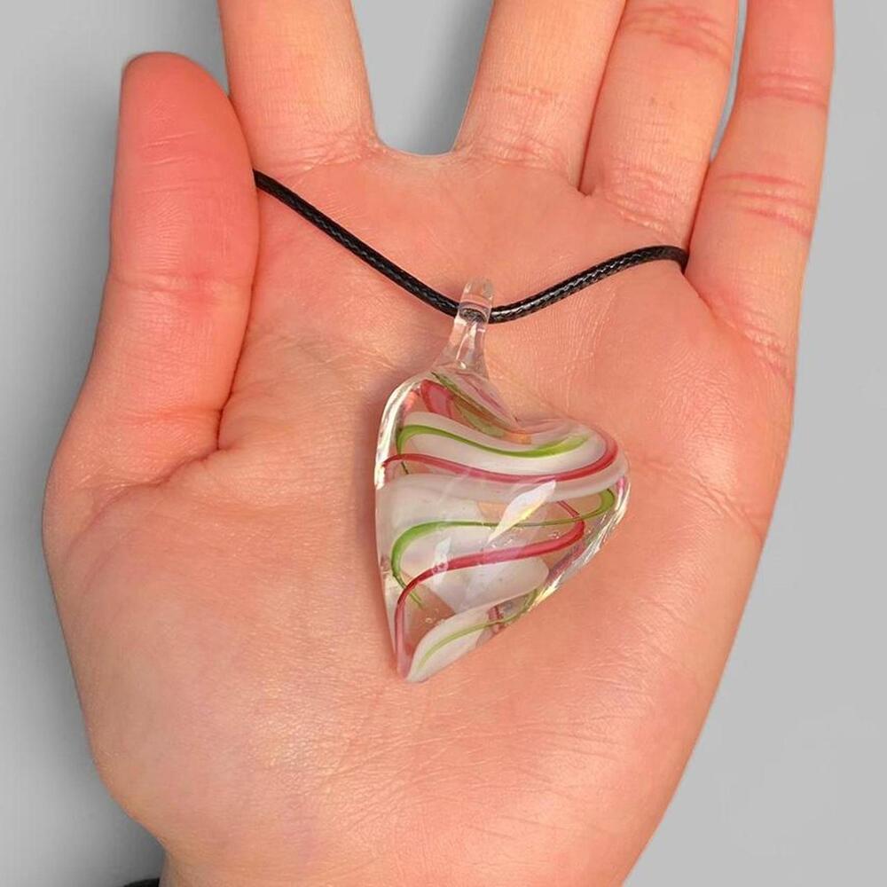 lovely green, red and white swirl heart shaped glass pendant on black cord! 🤍